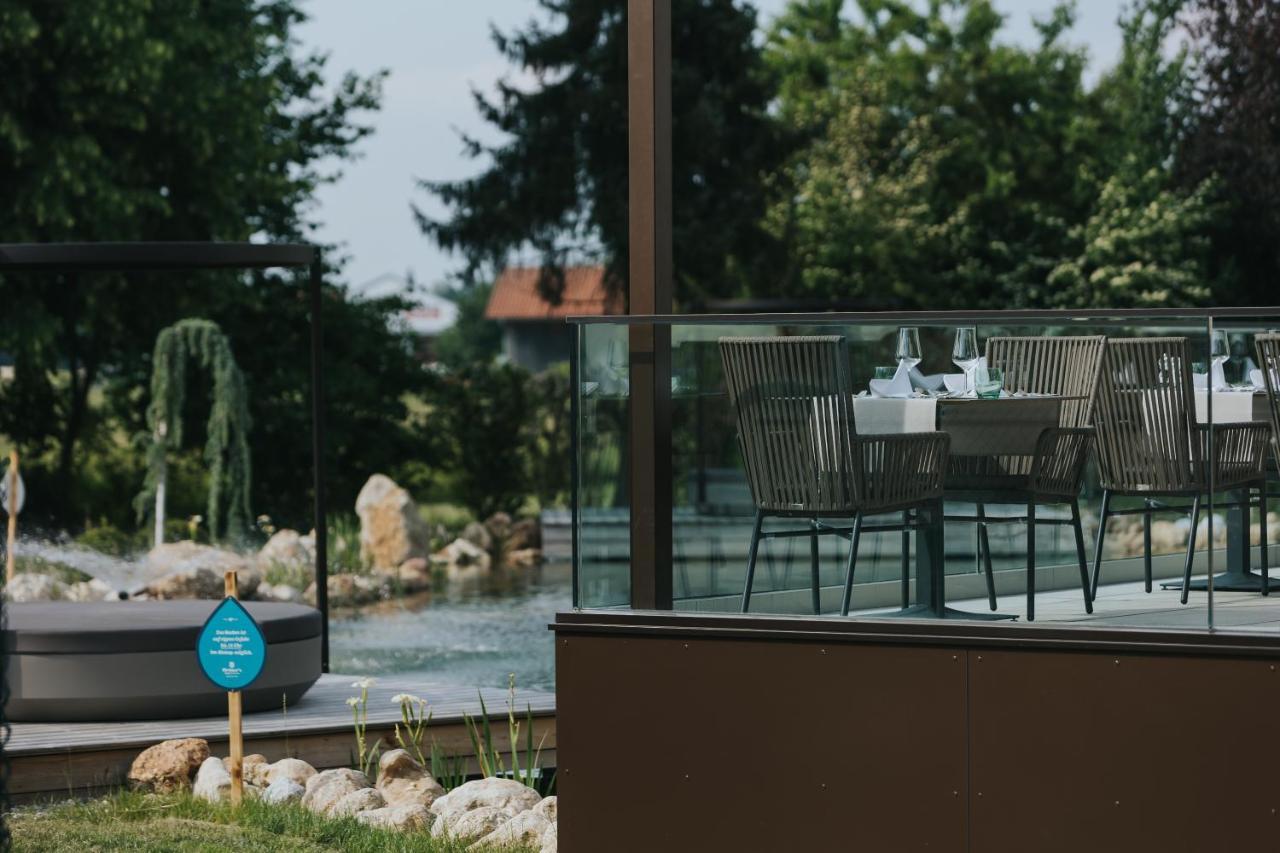 Ortner'S Resort Bad Fussing Bagian luar foto A glass balustrade